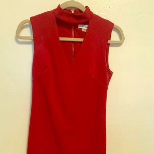 Cranberry Calvin Klein dress with choker detail.